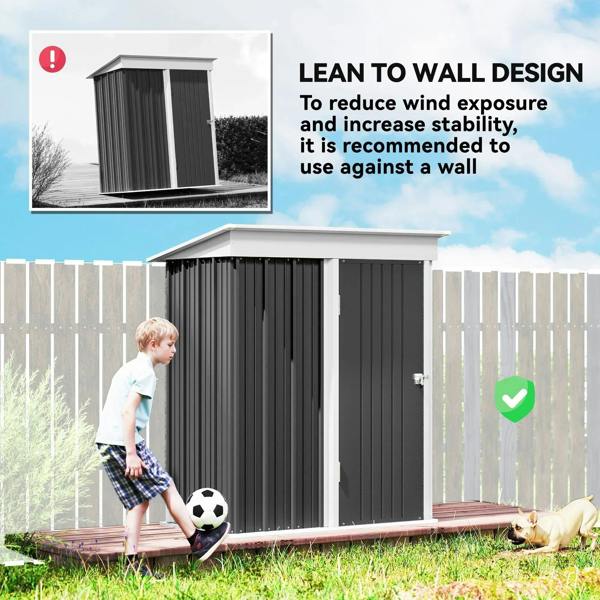 Lean-to wall-mounted metal shed with dark grey door panel and front access