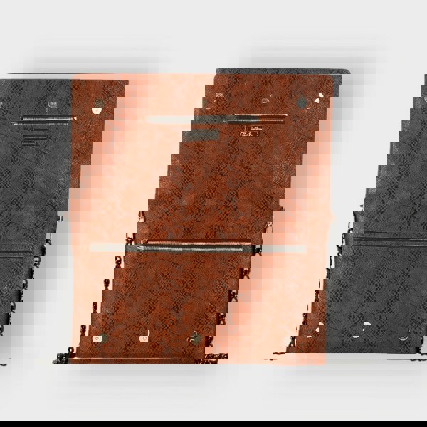 Chocolate Brown textured clutch bag with black chain handle on a light gray background