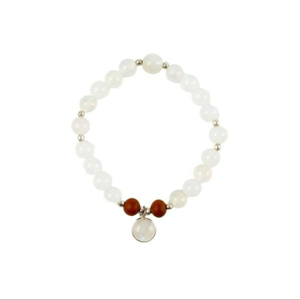 Selene purity mala bracelet by Kati Kaia with white beads, brown accents, and central pendant