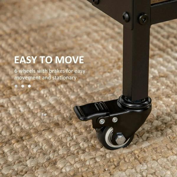 Black locking caster wheel on brown drop-leaf dining table frame
