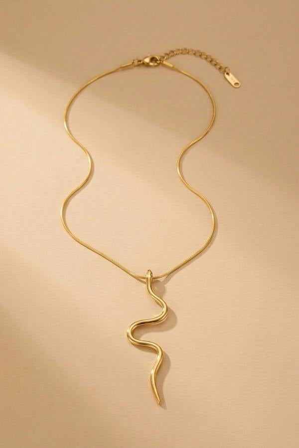 ARIIRA India Gold Tone Wavy Serpent Pendant