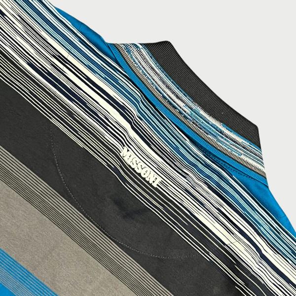 Supplied Fashion Missoni short sleeve polo shirt featuring a blue and grey striped knit pattern and ribbed collar.