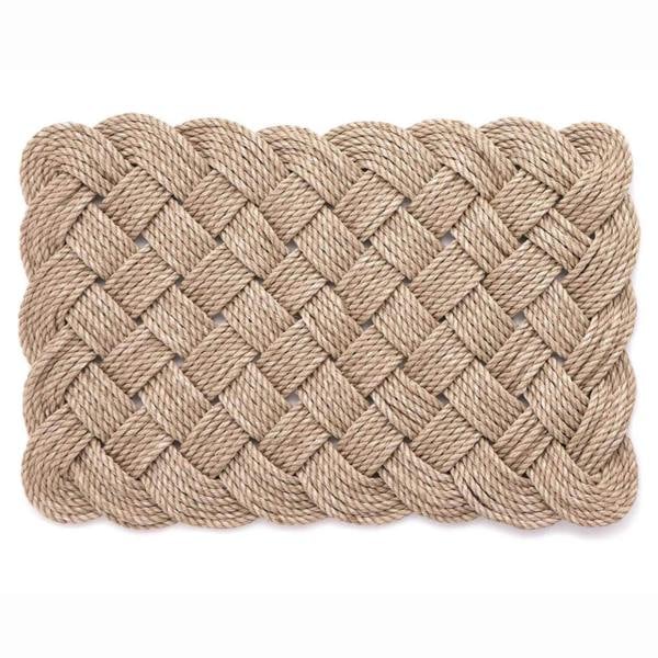 Woven rope mat on a white background