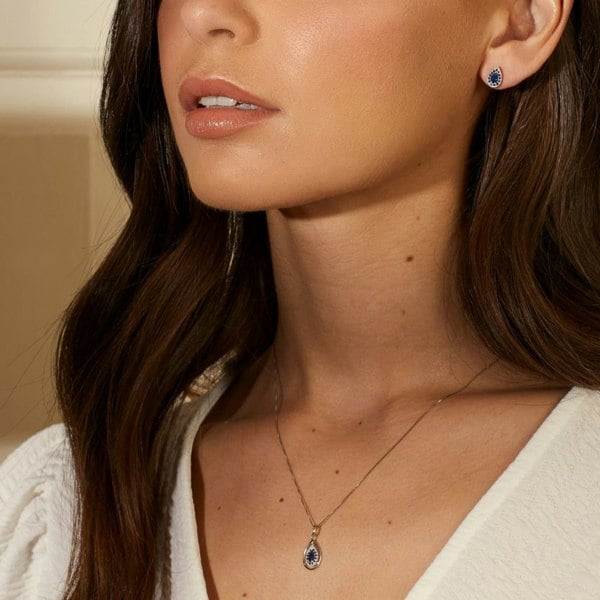 T. H. Baker 9ct White Gold Sapphire Teardrop Stud Earrings GE2378L