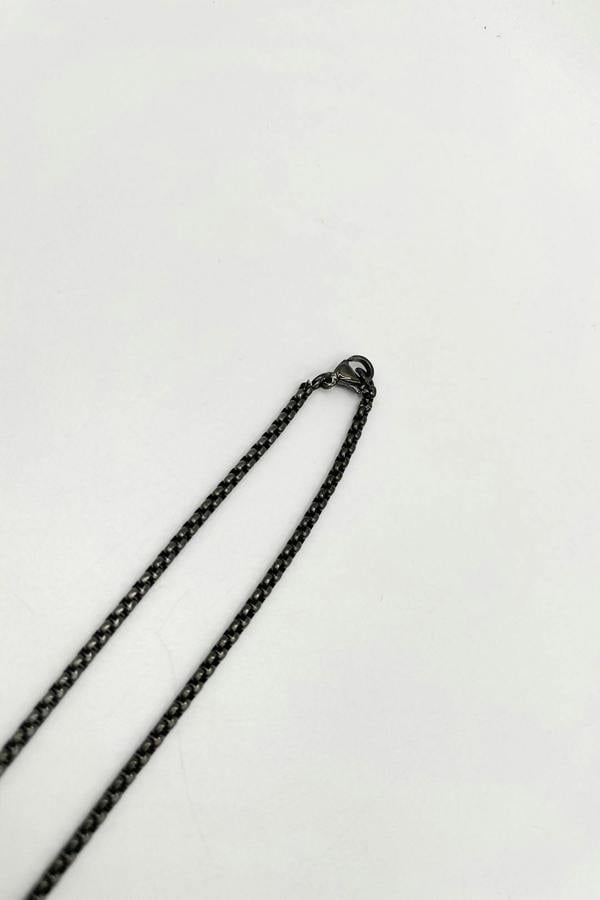 SVNX Cross Pendant Necklace in Black