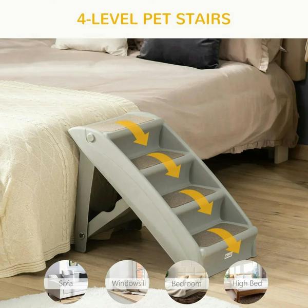 Grey 4-step pet stairs positioned at a bed, showing carpeted step treads