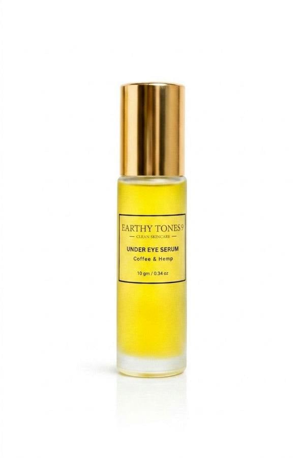 Earthy Tones 9 eye serum bottle with gold cap on a white background