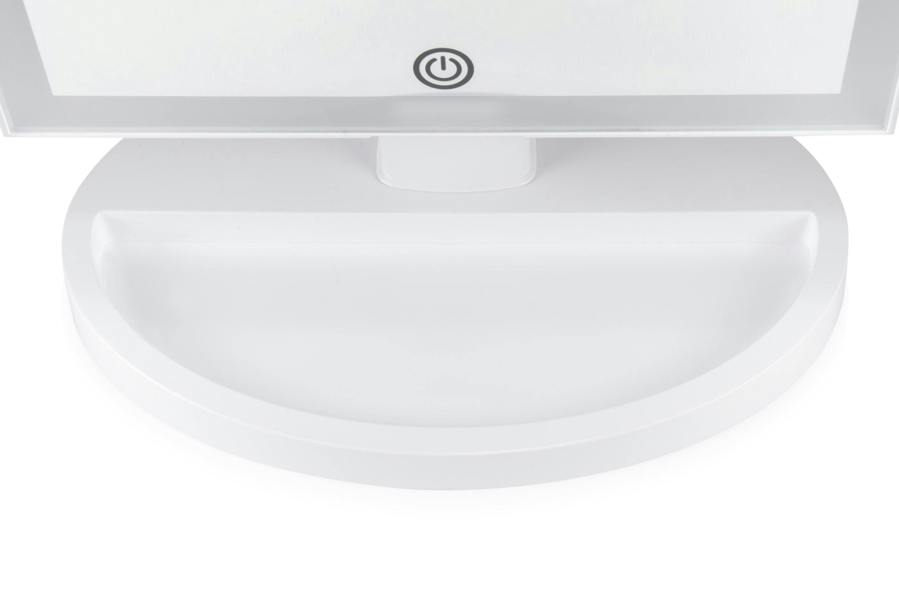 close up of base of mirror with built in storage compartment 