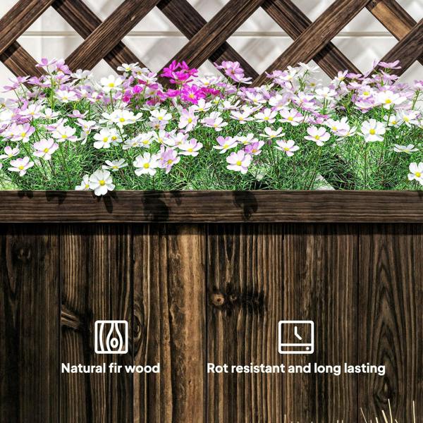 Carbonized wood planter bed with lattice trellis top and pink and white flowers