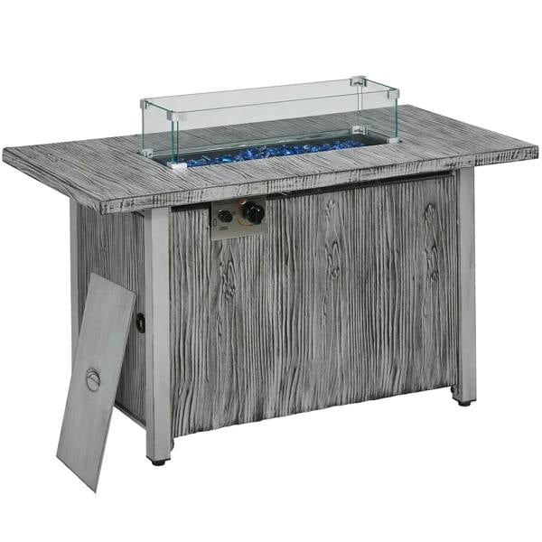 Grey gas fire pit table with glass screen, blue flame, and hinged access panel