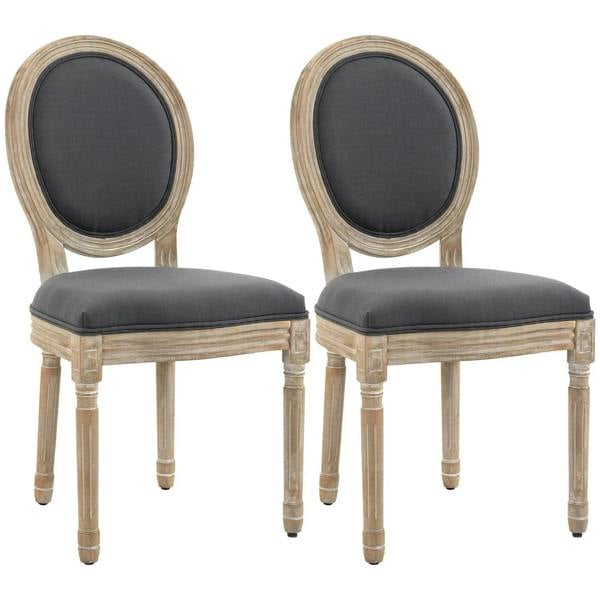 Set of two grey upholstered dining chairs with oval framed backrests