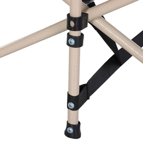Close-up of folding cot leg joint with black end caps and bolts