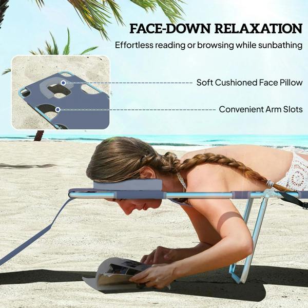 Grey sun lounger with face pillow and arm slots shown in sunbathing position.