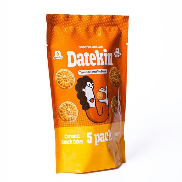 Side view of orange packaging of Datekin caramel snack cakes with a cartoon character on a white background