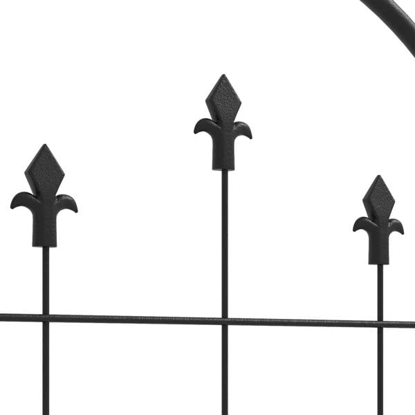 Close-up of black arched trellis tops with fleur-de-lis finials