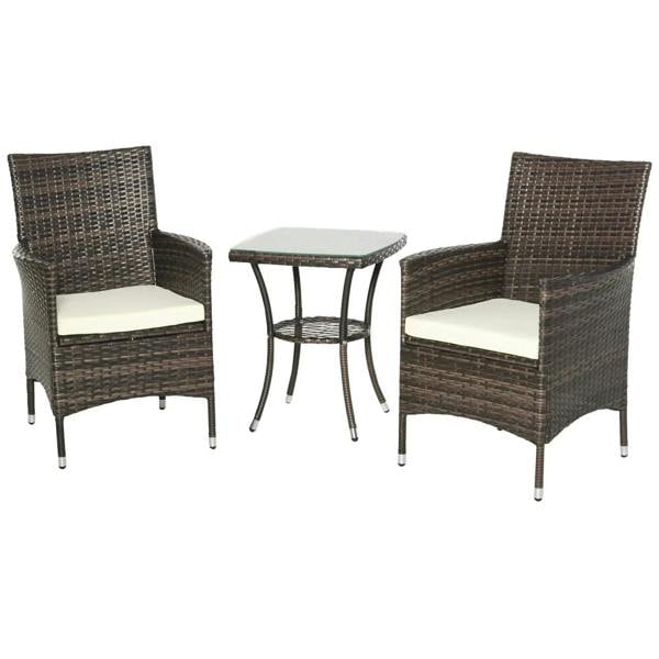 Brown rattan armchairs with white cushions and round glass-top side table
