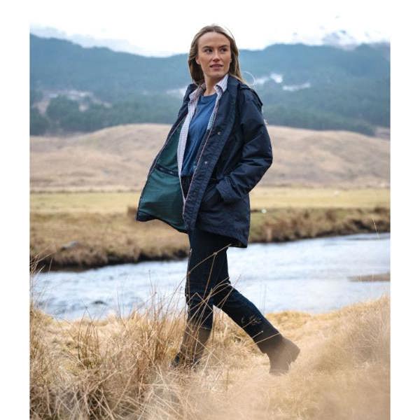 Women on mountain wearing the Navy Hoggs of Fife Fara waterproof jacket