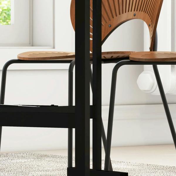 Black table leg and underside under grey marble-effect tabletop with caster base