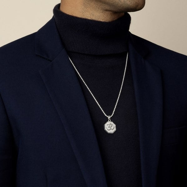 model wearing a hindu om aum amulet pendant with 1.8mm diamond cut rope chain in sterling silver