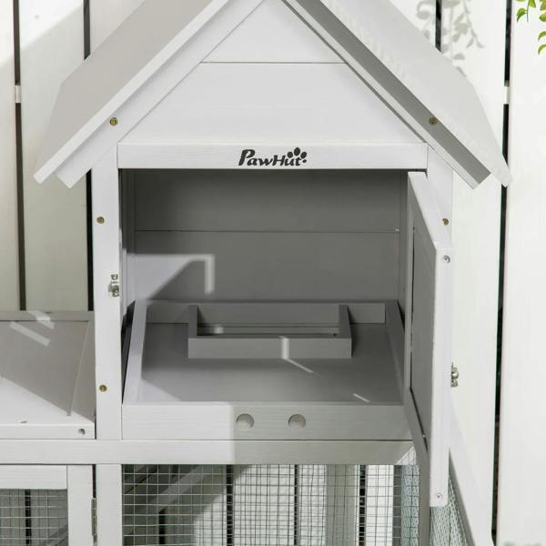 Light grey PawHut rabbit house with open front panel and interior nesting space