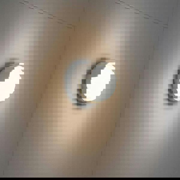 white IP65 bathroom wall light mounted on bathroom tiles 