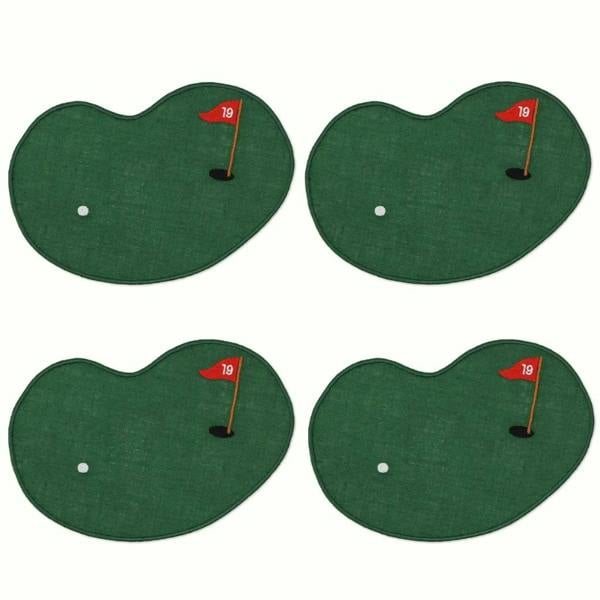A set of four green linen cocktail napkins cut into the organic shape of a golf putting green, each detailed with an embroidered white ball and a red flag displaying the number 19.