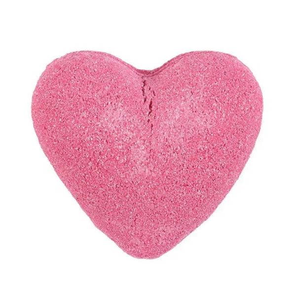 Pink heart-shaped cherry bath bomb, full view with rough sparkling surface