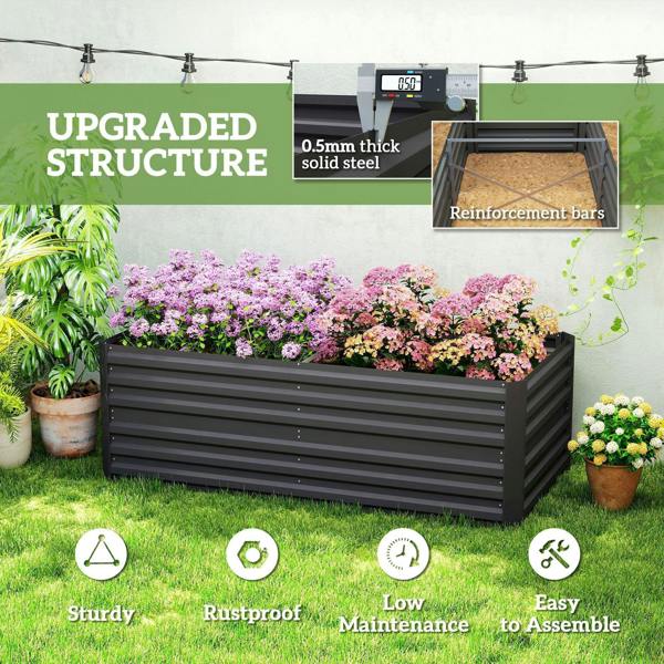 Black raised garden bed with visible reinforcement bars under the planter