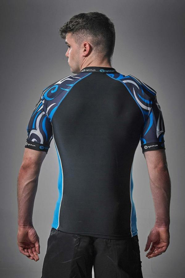 Black Optimum Razor protective top with blue tribal-print padded shoulders, rear view on model - Optimum