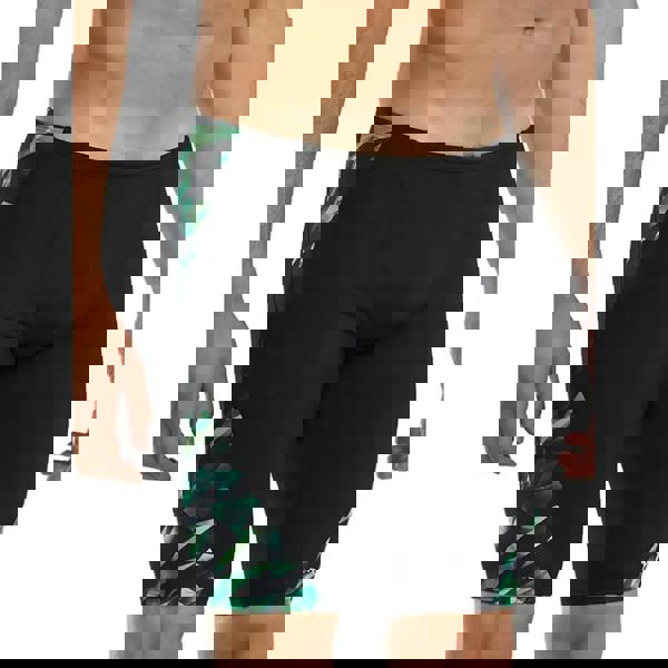 Green TYR Triadic Durafast Elite swim jammer with black leaf print