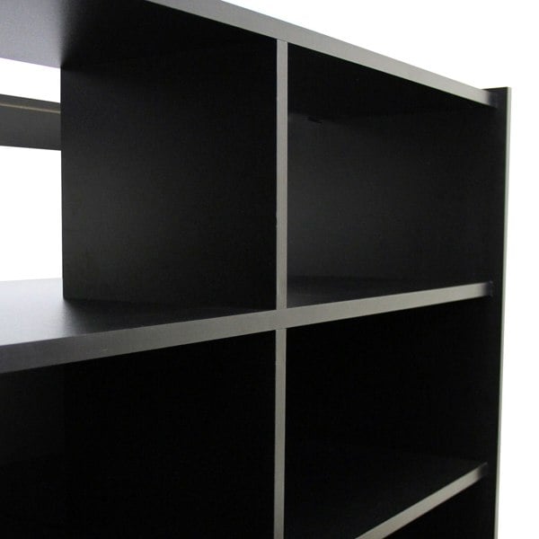 B1200 retail shop counter in sleek black finish featuring open shelving and a modern design, ideal for displaying products