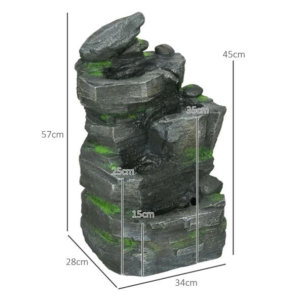 Dark grey stacked rock water fountain with green moss details