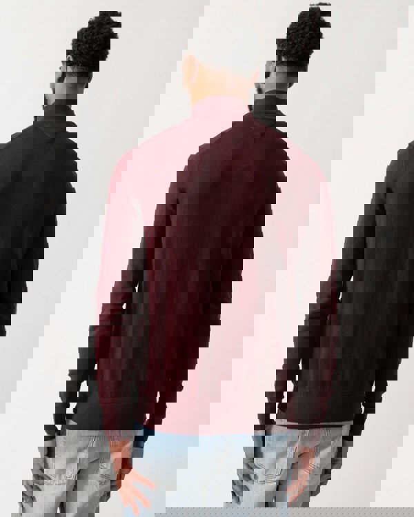 back shot of a model wearing a Tommy Hilfiger Organic Cotton Cashmere Mens Zip-Mock Sweater in Deep Burgundy