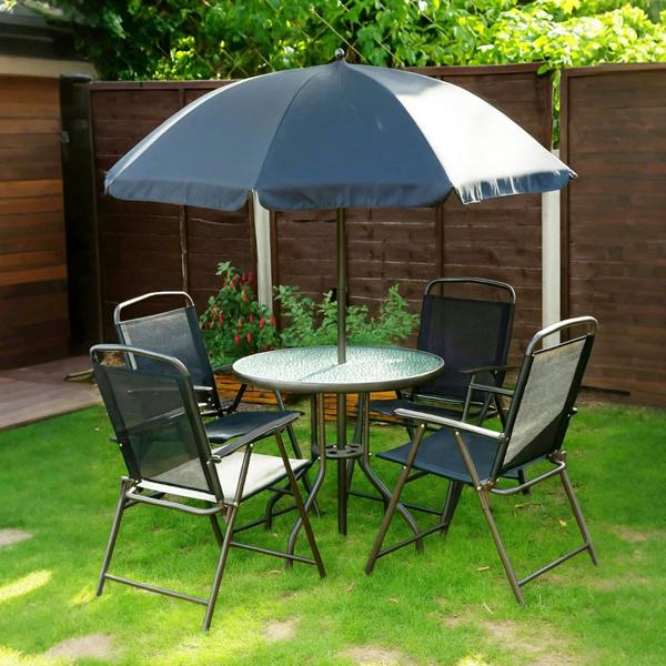 Black patio dining set under open umbrella with round glass table and four folding chairs