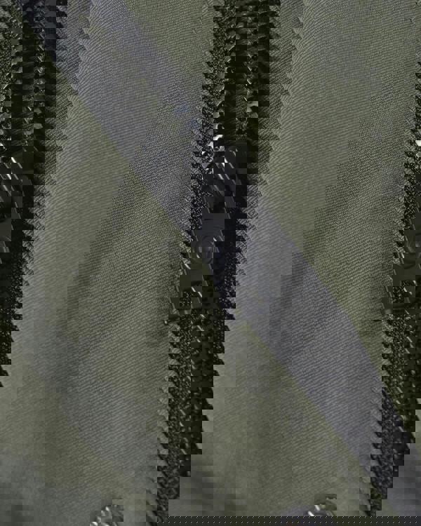 Lambretta Mens Utility Hooded Quilted Classic Badged Parka, close-up of durable black zipper on olive green fabric.