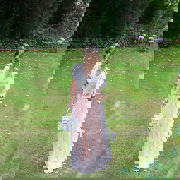 pretty girl playing with petals