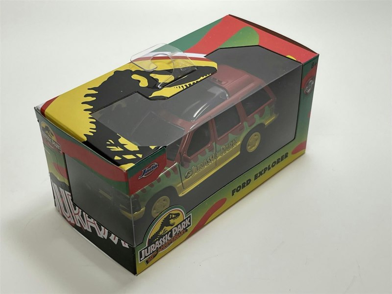 a toy car in a box