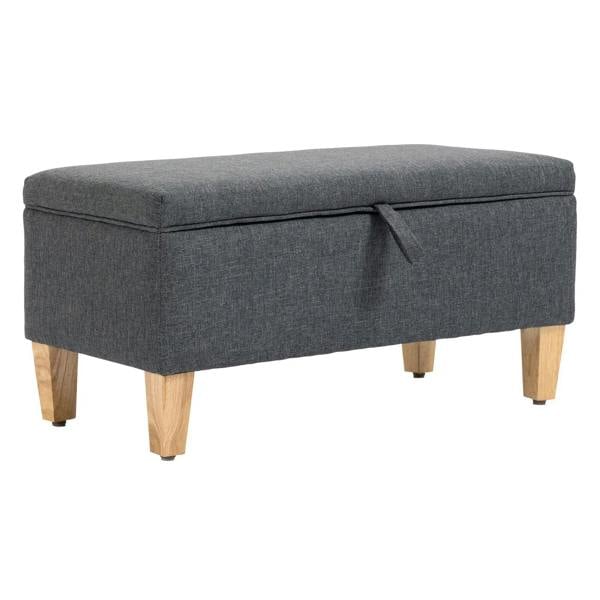 Dark grey upholstered storage ottoman with padded top and light wood legs