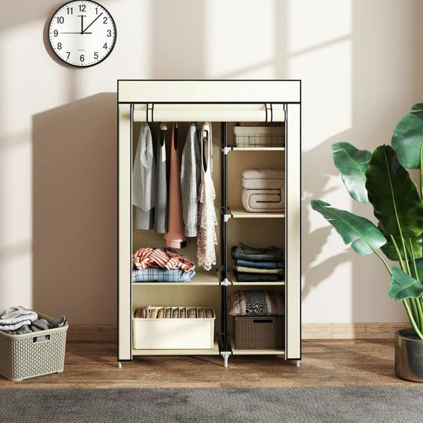 Cream fabric wardrobe with hanging rail, shelves, and bins for organized storage
