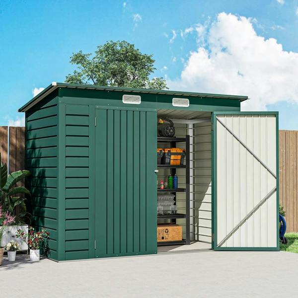 Green metal storage shed with one side door open, showing interior shelving and items