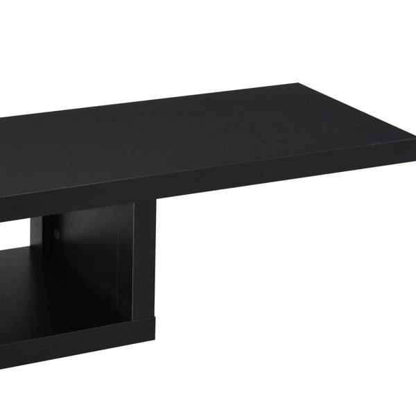 Black floating TV console corner view with open shelf interior