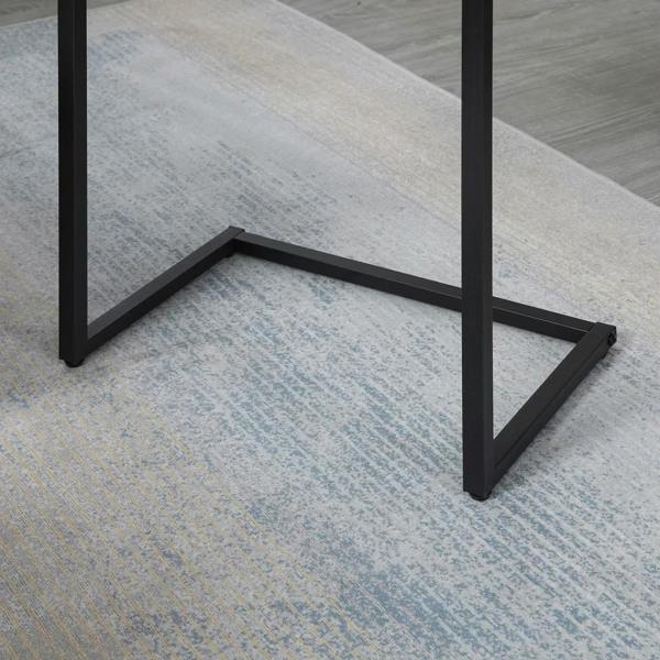 Black steel base support brace under a nesting side table