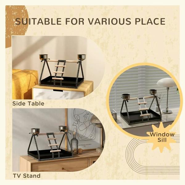 Black bird feeding stand with wood ladder and two stainless bowls, on a cabinet top