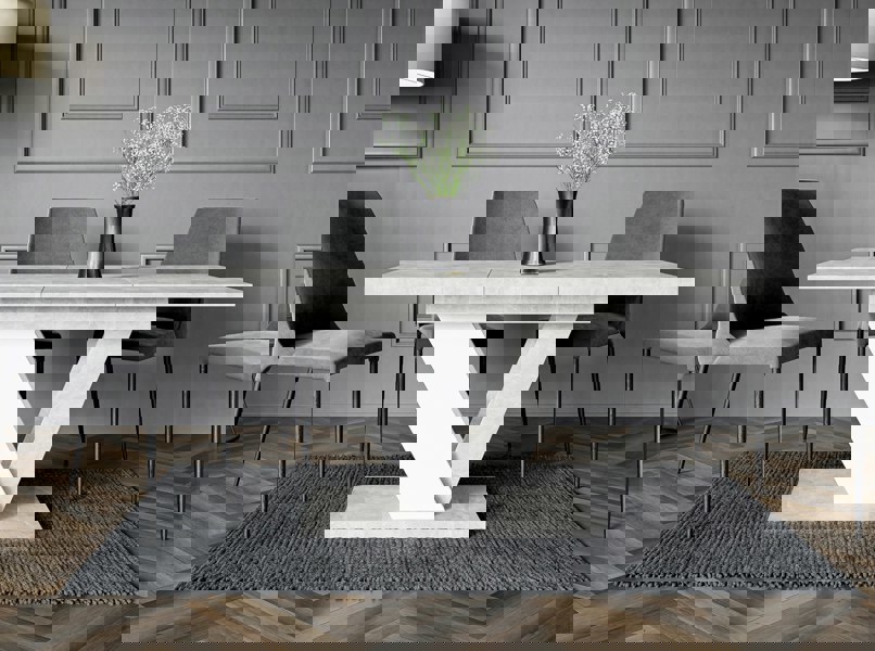 Dining room with a modern table and chairs in a gray interior setting