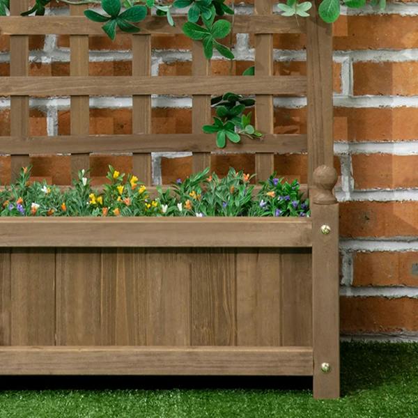 Brown wooden raised planter with trellis grid and herb plants along the front edge