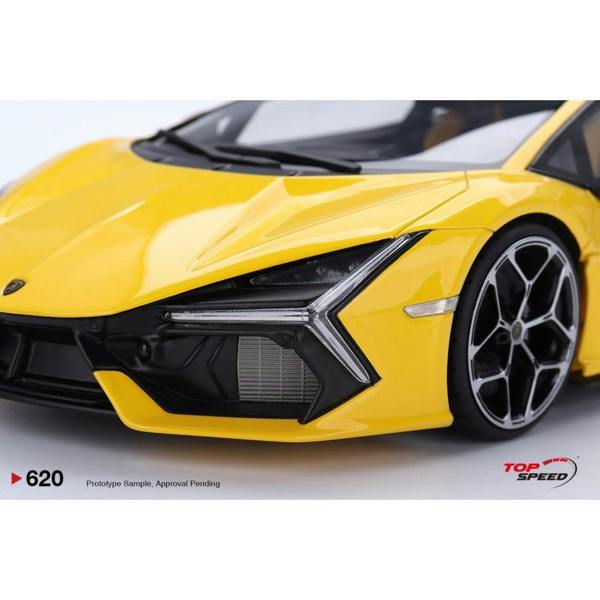 a yellow sports car with black trim