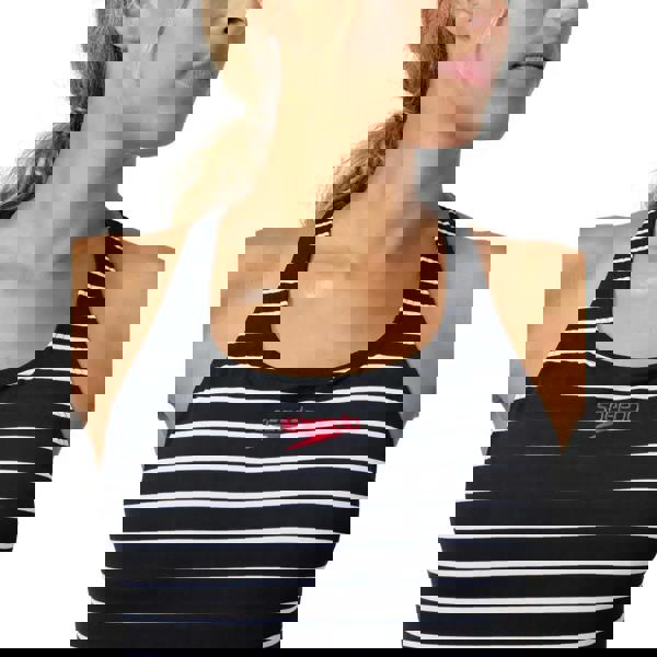 Black and white striped Speedo Endurance+ printed medalist swimsuit top with pink logo