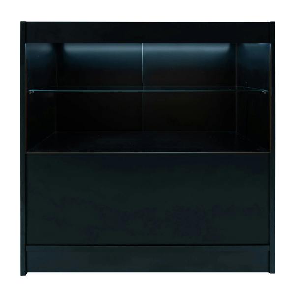 Sleek black Andromeda LED shop counter set with a glass shelf, featuring modern design and illuminated display area for products