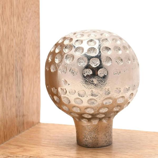 A pair of custom engraved wooden football bookends against a clean white background, showing the words 'Tanner's' and 'Books' beneath a metallic boot and ball.