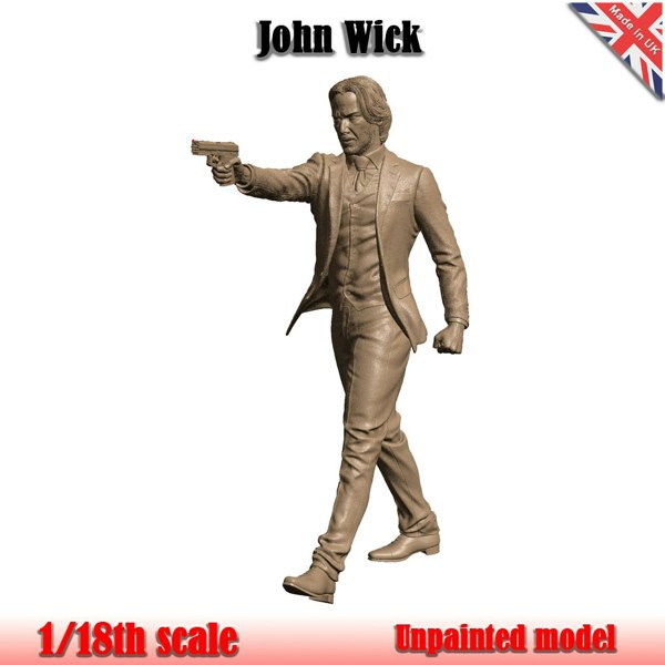 a statue of a man holding a gun